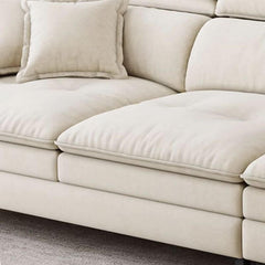 Plush cushions of the L-shape chaise