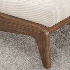 Sturdy ash wood lounge chair on a rug