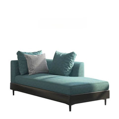 Decorative off-white chaise lounge with accent pillows