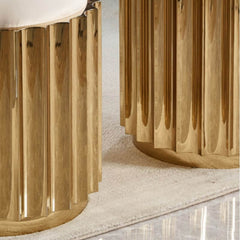 Elegant cream accent stool by an entryway