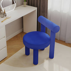 Stylish vanity stool displayed in a dressing room