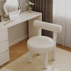 Beige upholstered vanity stool with metal legs