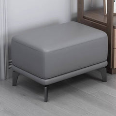 Brown rectangular footstool with black legs