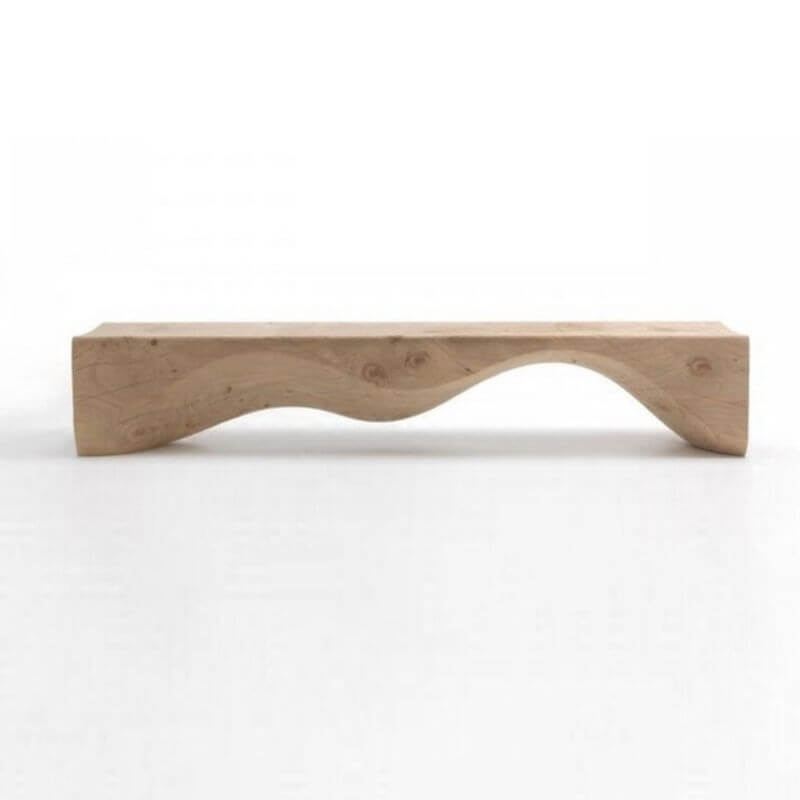 Natural finish wooden bench in living room