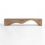 Natural finish wooden bench in living room