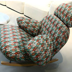 Green spindle rocking chair decorating a space