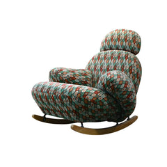 Green spindle rocking chair decorating a space