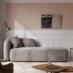 Cozy left-arm chaise in vibrant apricot