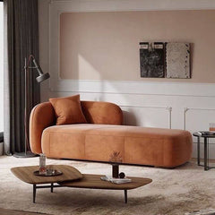 Elegant orange chaise in a modern setting