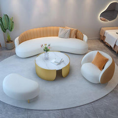 cozy pillows on white curved sofa