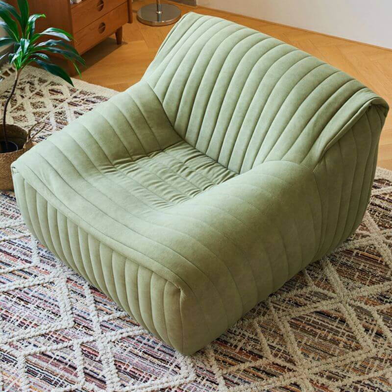 Single seater bean bag chair in light green suede