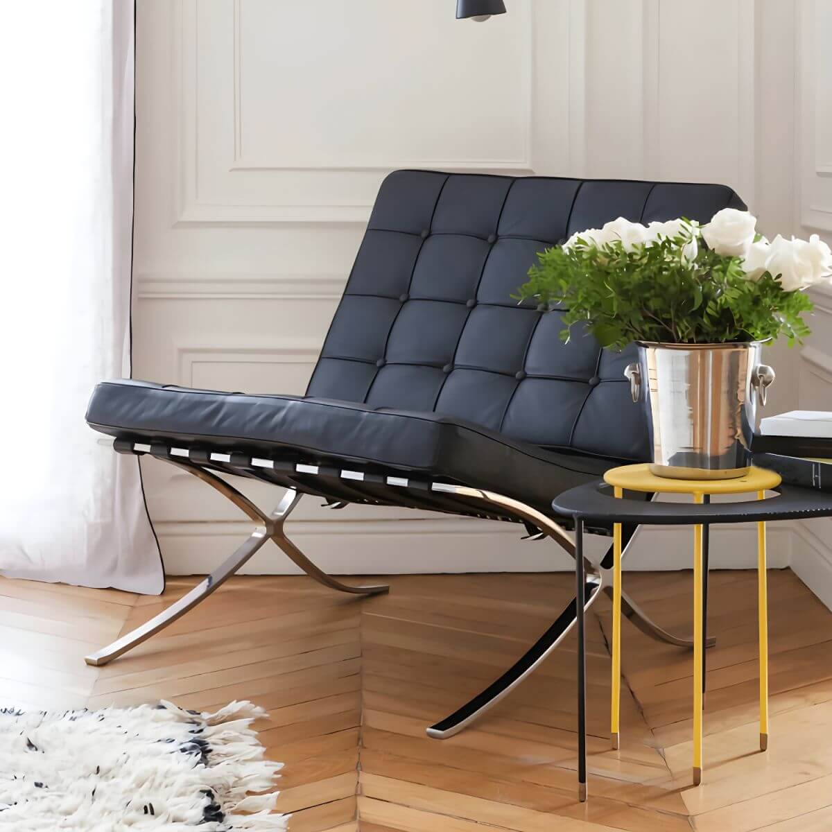 Stylish black recliner with metal legs