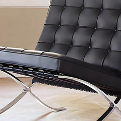 Metal-leg black recliner from side view