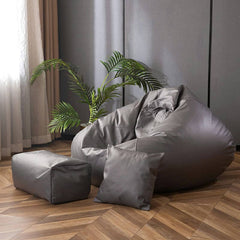 Modern dark gray bean bag ottoman in living room