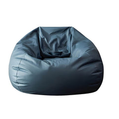 Comfortable black bean bag chair on carpet