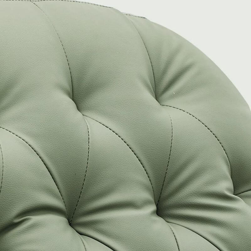 Blue upholstered rocking chair in a modern room