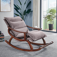 Stylish modern upholstered rocking chair in grey color