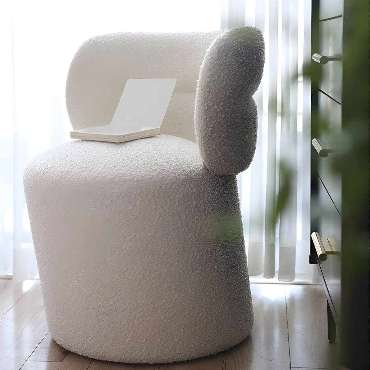 Elegant white upholstered vanity stool with beige seat