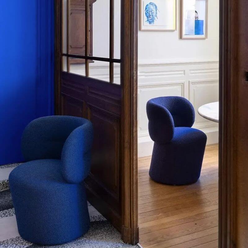 Stylish dark blue vanity stool in a modern interior