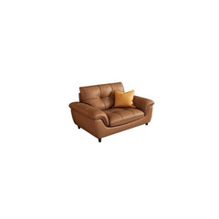 Mocha colored sofa with decorative pillows