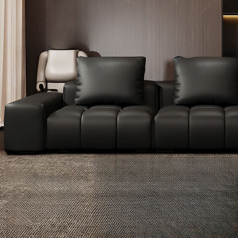 Living room featuring black parlor sofa