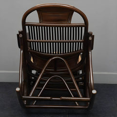 Side view of black rattan rocking chair