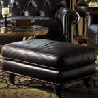 Traditional upholstered accent stool with black legs