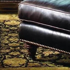 Classic black accent stool for versatile use