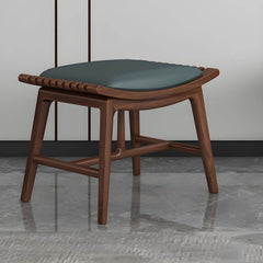 Sturdy wooden legs of accent stool