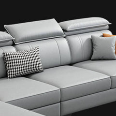 Cozy dove grey sofa in stylish living room