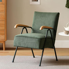 Trendy green accent chair from a side view