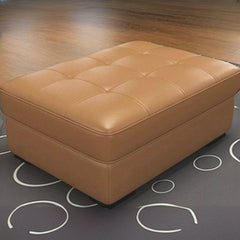 Orange upholstered footstool for vibrant spaces