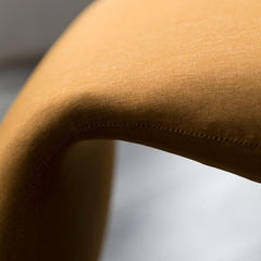 Close-up of Black Upholstered Stool