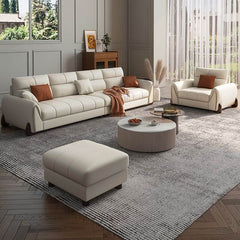 Flared arm design of ivory sofa couch