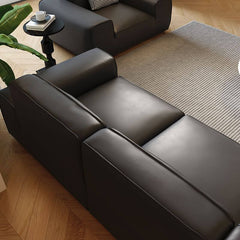 Ink color sofa in stylish setting