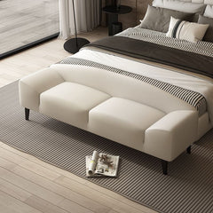 Grey upholstered accent bench in modern living room