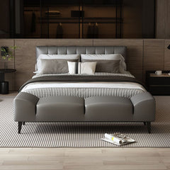 Off-white accent bench near a bed