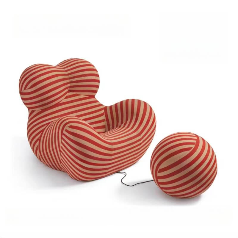 Burgundy arm chair with stylish ottoman