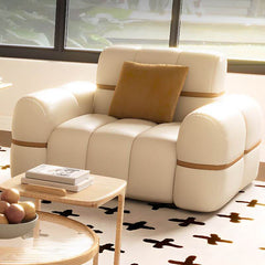 Plush cushions on trendy sofa