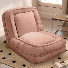 Trendy White/Rose Lounge Chair in cozy living room setting