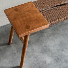 Natural wood accent chair in foyer