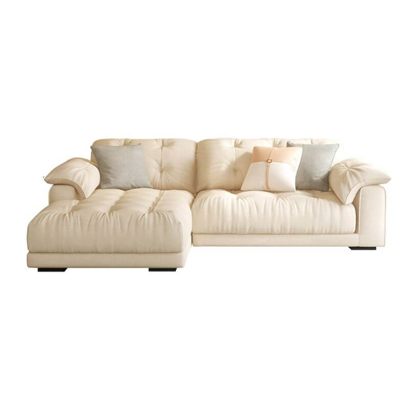 Profile view of the cream sofa