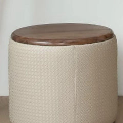 Close-up of the upholstery on brown vanity stool