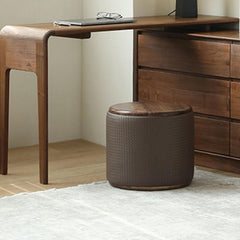 Stylish brown vanity stool set against a bright background