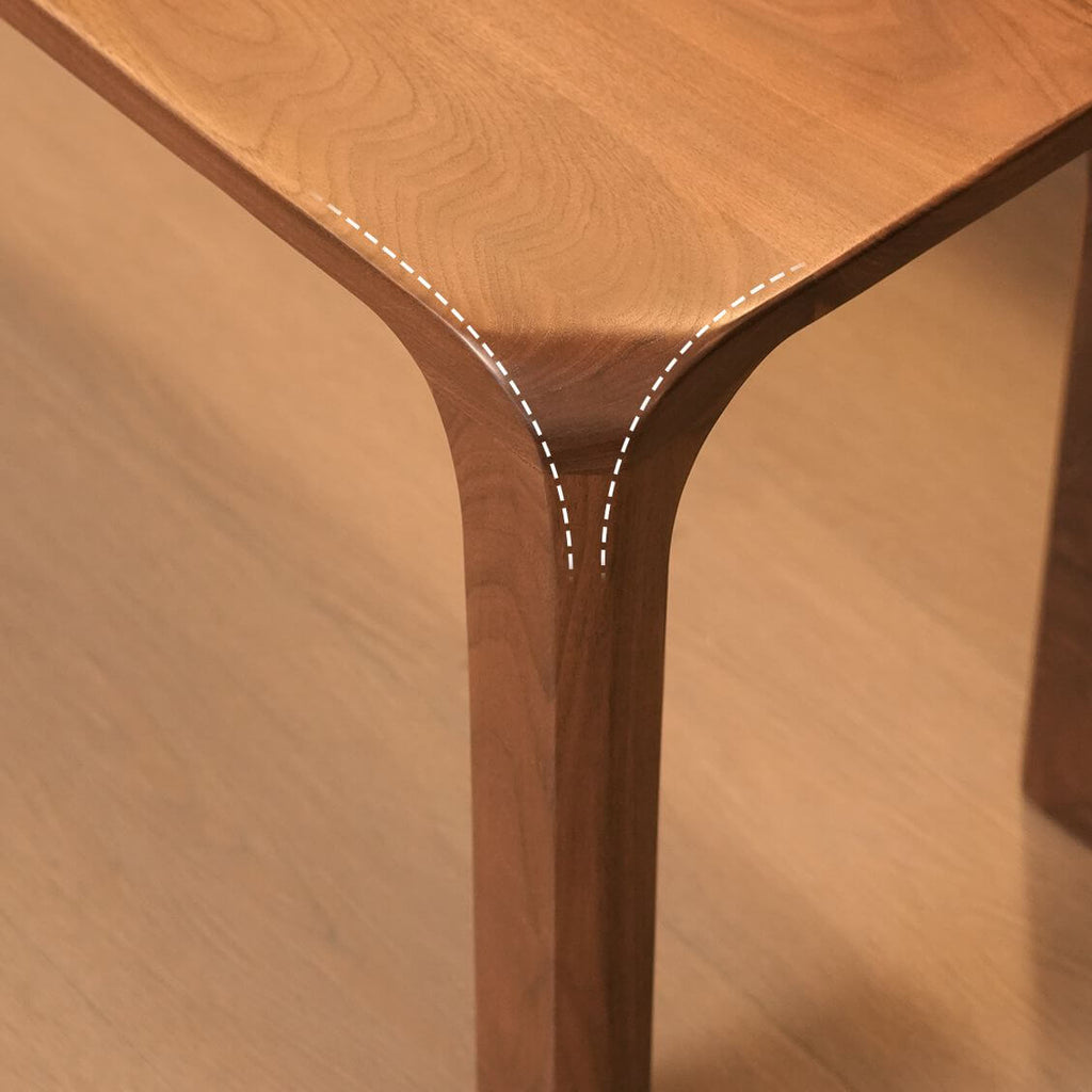 Elegant brown bench paired with a dining table