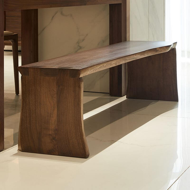 Close-up of the grain pattern on the wooden surface of the dining bench
