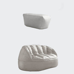 water resistant faux leather bean bag chair against a wall