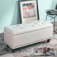 Butter colored upholstered ottoman with legs