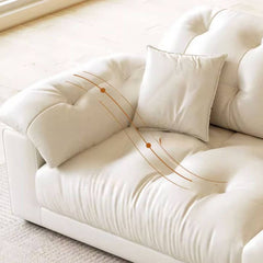 Cozy seating area featuring white sofa