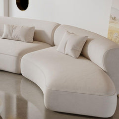 Plush cushions of the white sofa